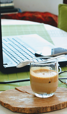 Coffee on desk 226x387 careers feature hero banner