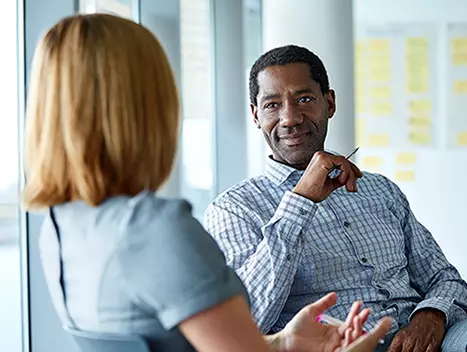 Two colleagues in a meeting