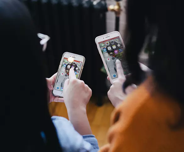 People on phones tab image